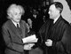 Germany / USA: Albert Einstein (1879-1955) receiving his Certificate of American Citizenship from Judge Phillip Forman, 1 October 1940